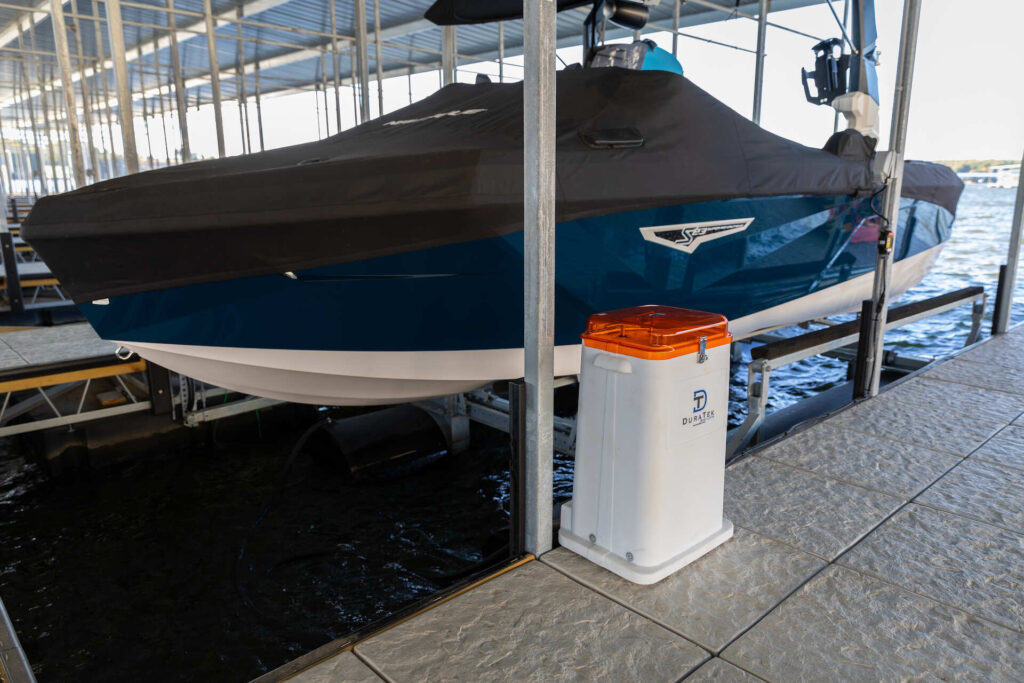 A high-end dock accommodating five motor boats with protective covers