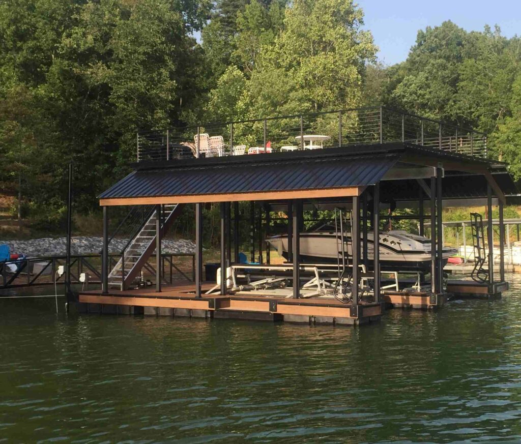 A stunning dock featuring a black powder-coated cable railing system with upgraded color PVC wrap, showcasing modern design and durability.